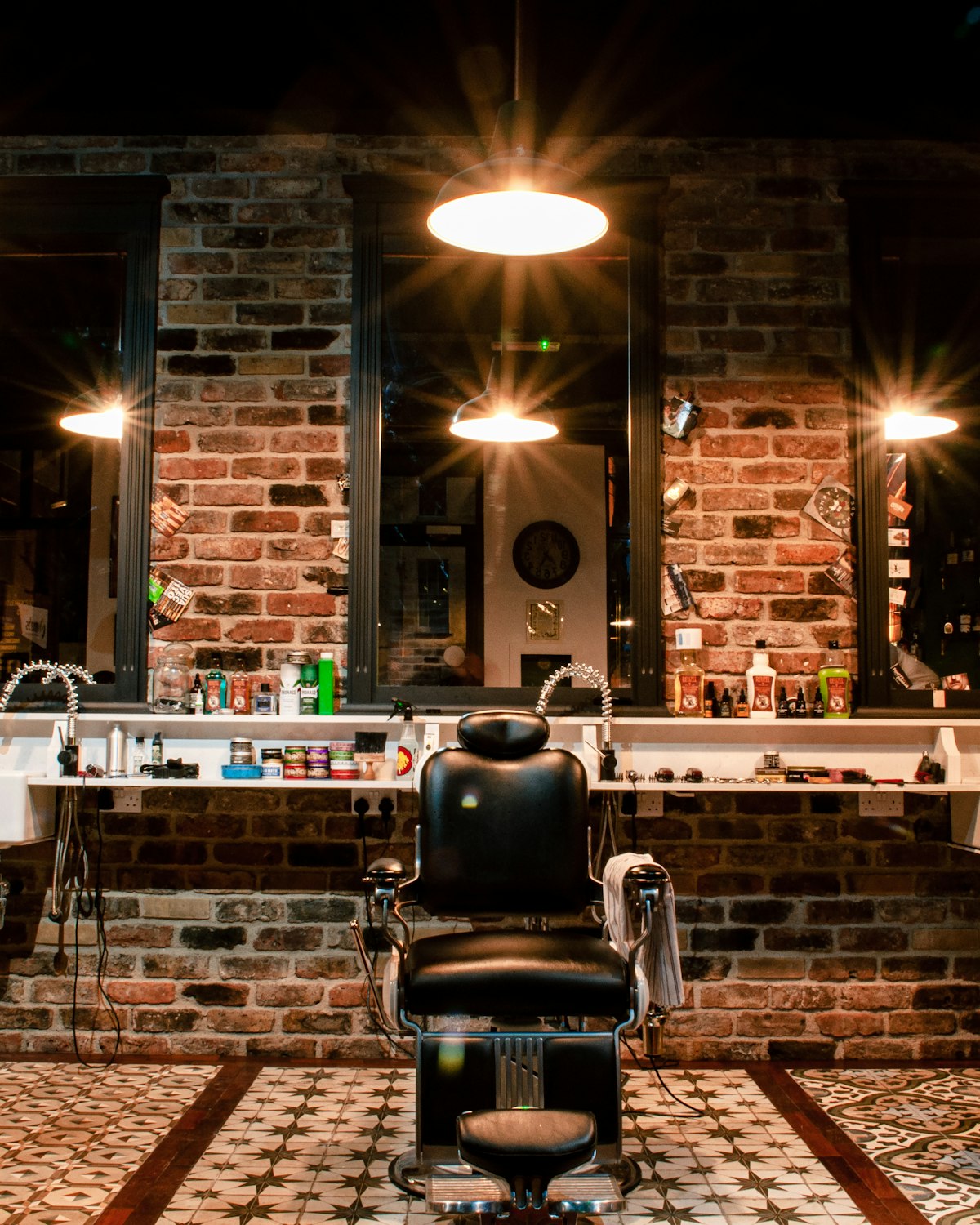 Clippers, shears and combs laid out on the counter